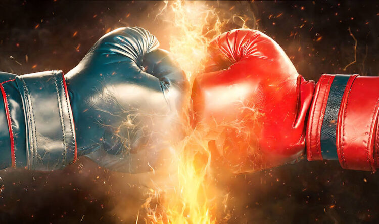 Zwei Boxhandschuhe im Kampf