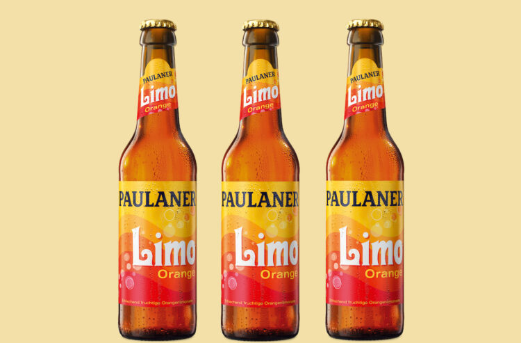 Drei Flaschen Paulaner Limo Orange